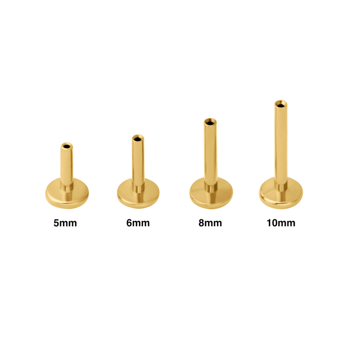 Set of four gold threadless labret earring posts with labeled sizes on a white background