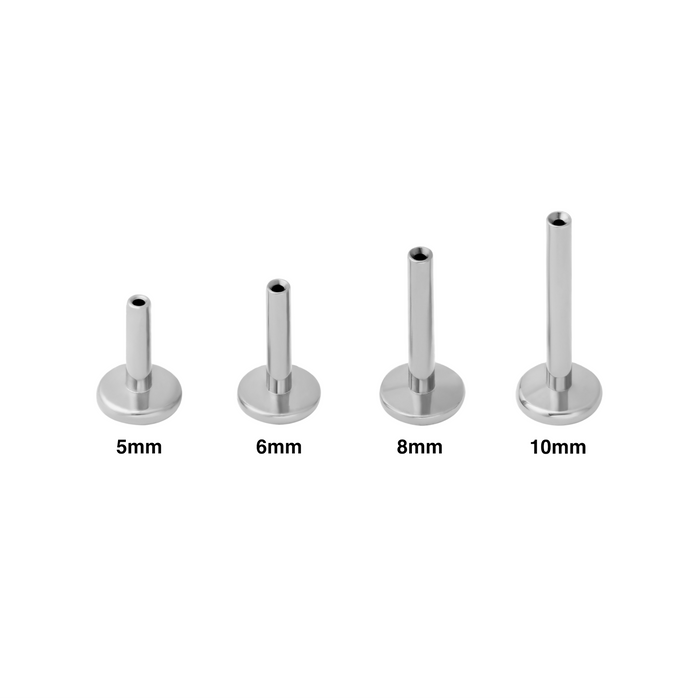 Set of four titanium threadless labret earring posts with labeled sizes on a white background