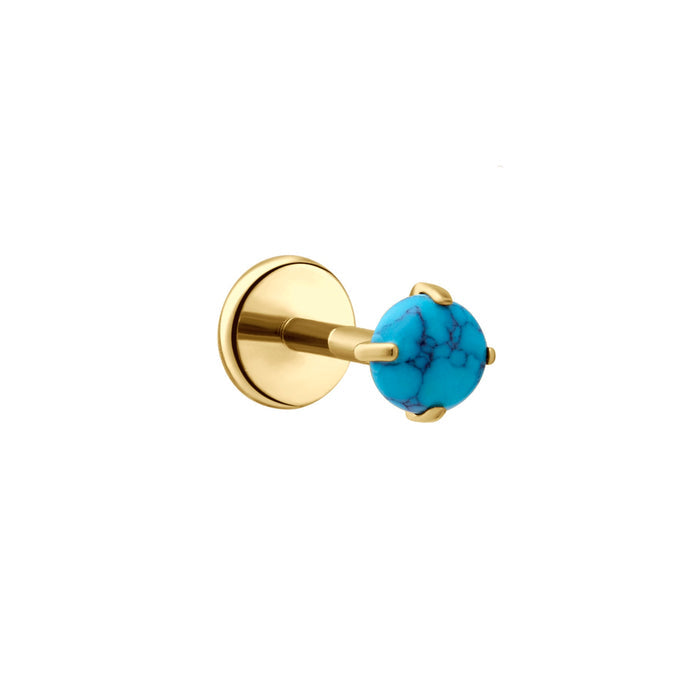 Gold flat back stud earring with a prong-set, blue faux turquoise stone on a white background