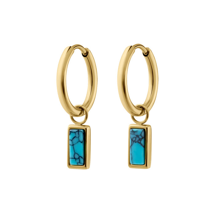 Gold hoop earrings with faux turquoise stone drops on a white background