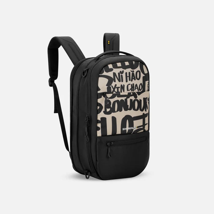 A Sherpani Camden Ciao Ultimate Backpack, 3/4 view showing unzipped extender and strap options on white backdrop. #color_ciao-print