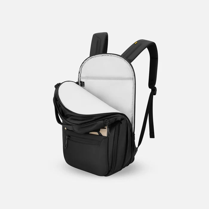 A Sherpani Camden Ciao Ultimate Backpack, 3/4 view showing inside of laptop pocket on a white background. #color_ciao-print