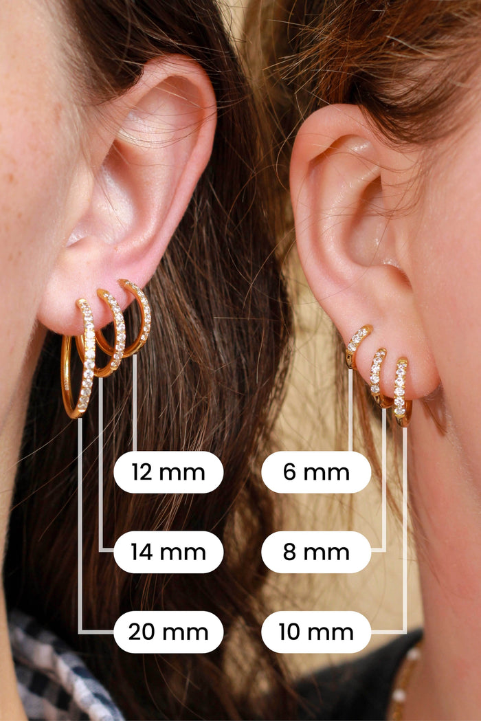 Comparison of 6 different sizes of gold hoops on the ears of 2 models.