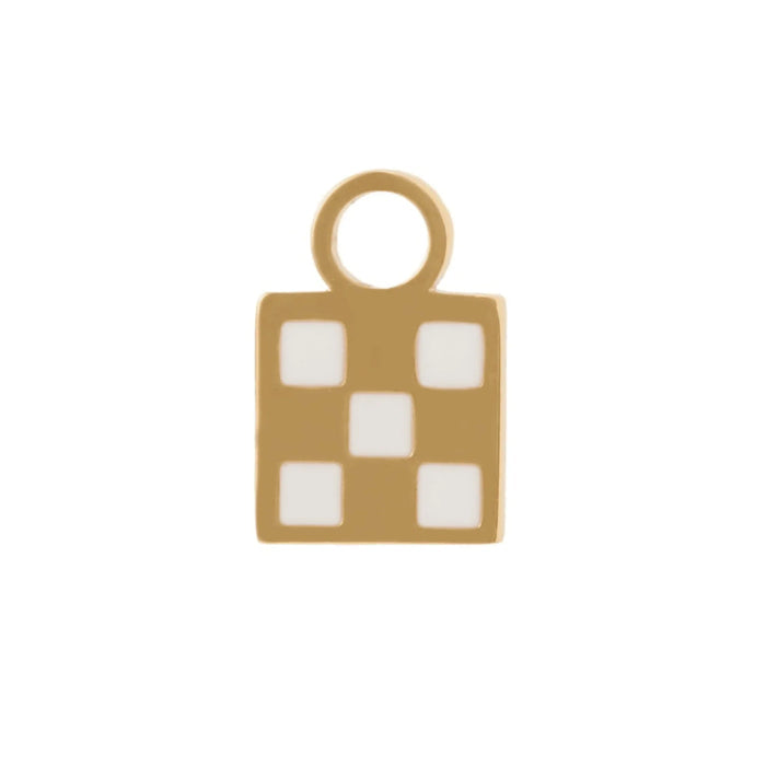 Gold charm with a  checkered white enamel design on a white background