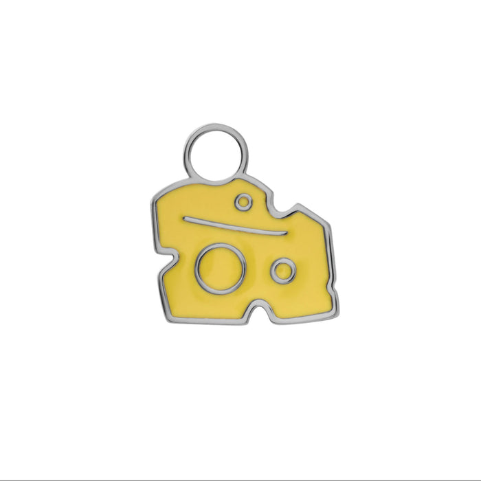 Titanium-colored charm shaped like a cheese wedge with yellow enamel on a white background