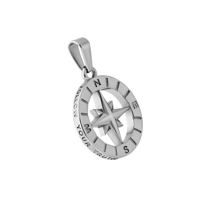 Silver compass pendant with 'Follow Your Truth' engraving on a white background