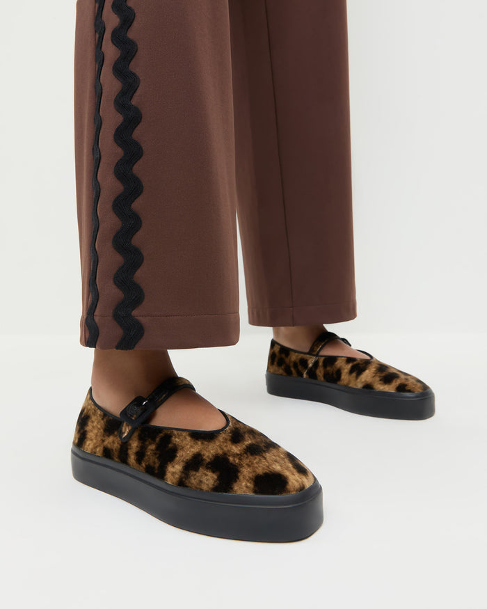 Cooper Leopard Velvet Mary Jane Sneaker in leopard print velvet and Venus Track Pant in brown nylon.