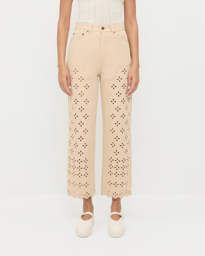 Demi Embroidered Pant in tan Japanese cotton twill with eyelet lace, Kerri Pointelle Tee in white cotton, and Cooper Natural Mary Jane Sneaker.