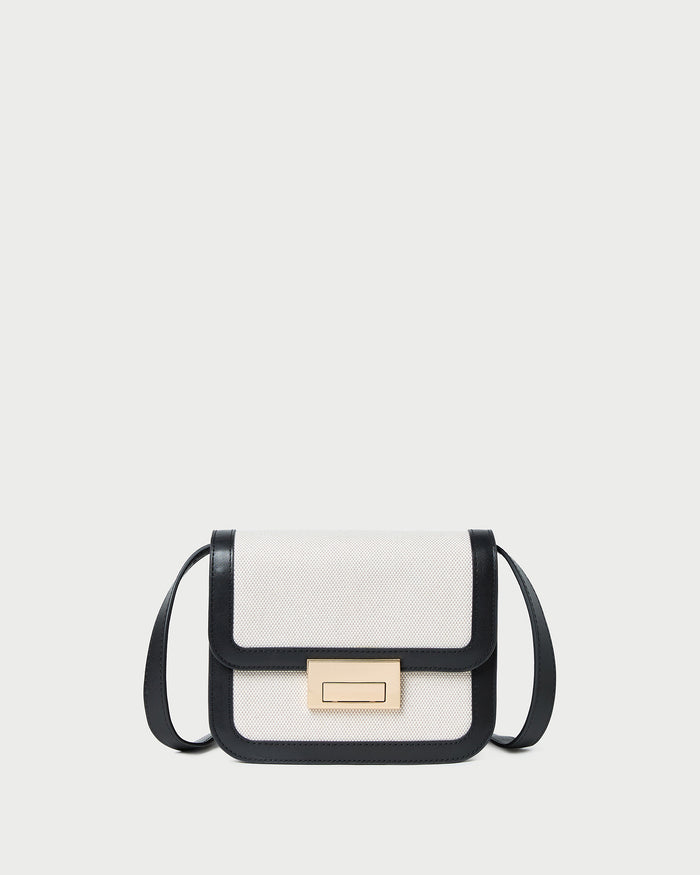 Desi Black/Natural Canvas Crossbody in natural canvas with black leather accents.