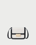 Desi Black/Natural Canvas Crossbody in natural canvas with black leather accents.