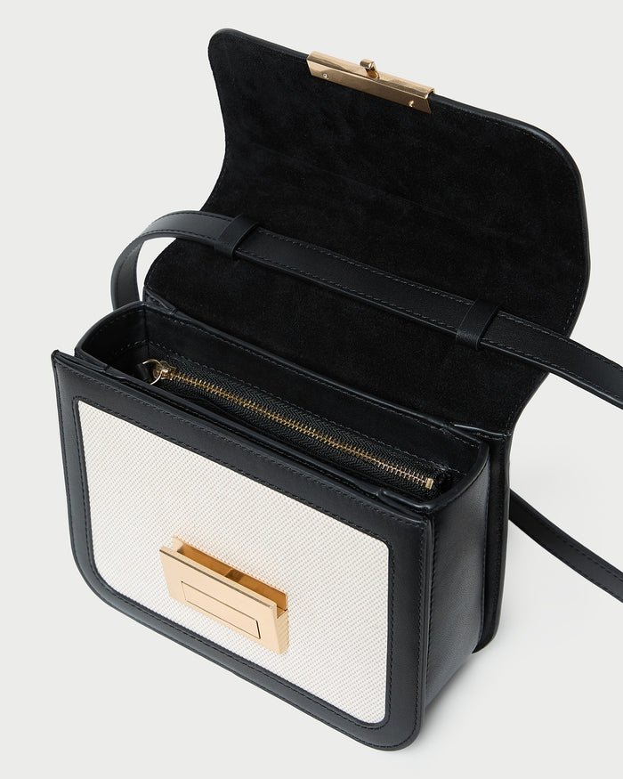 Desi Black/Natural Canvas Crossbody in natural canvas with black leather accents.