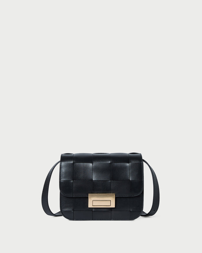 Desi Black Woven Leather Crossbody in black woven leather.