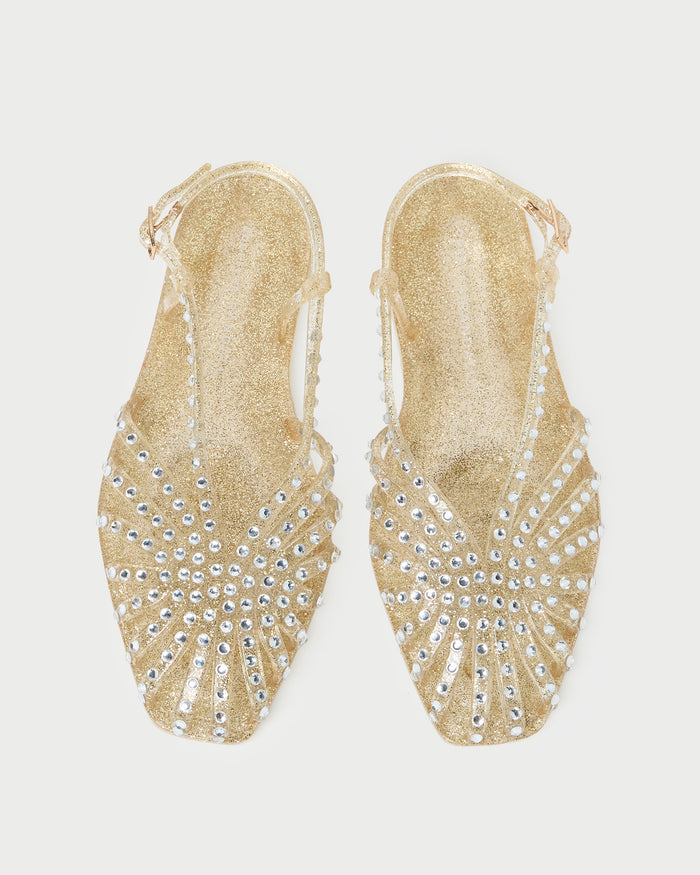 Devon Champagne Jelly Slingback Sandal in champagne jelly with crystal embellishments.