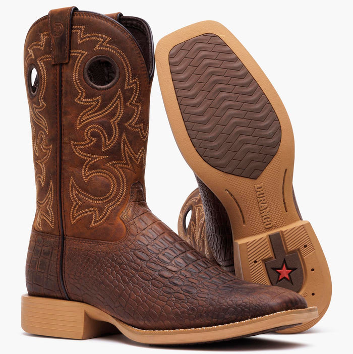 Front outsole view of a pair of Durango brown crocodile print cowboy boots