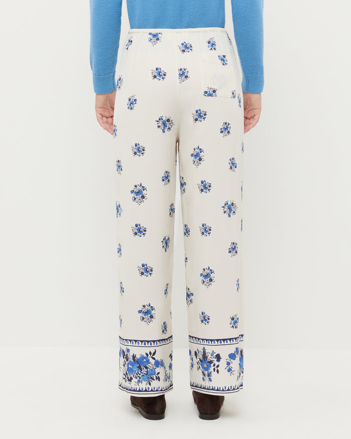 Esha Pant in cream and blue silk, Wynn Cardigan in cornflower blue wool, and Noelle Brown Suede Ballet Flat.