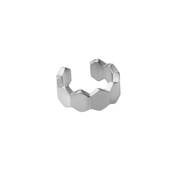 Close up of a model wearing a cuff earring made from stacked hexagon shapes. Hoop made from stainless steel.