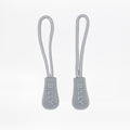 Two light grey zipper pulls with BILLY brand logo on a white background
