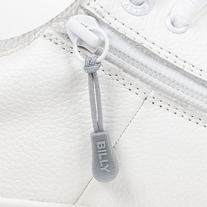 Light Grey sport zipper pull with BILLY word mark attached to a white shoe
