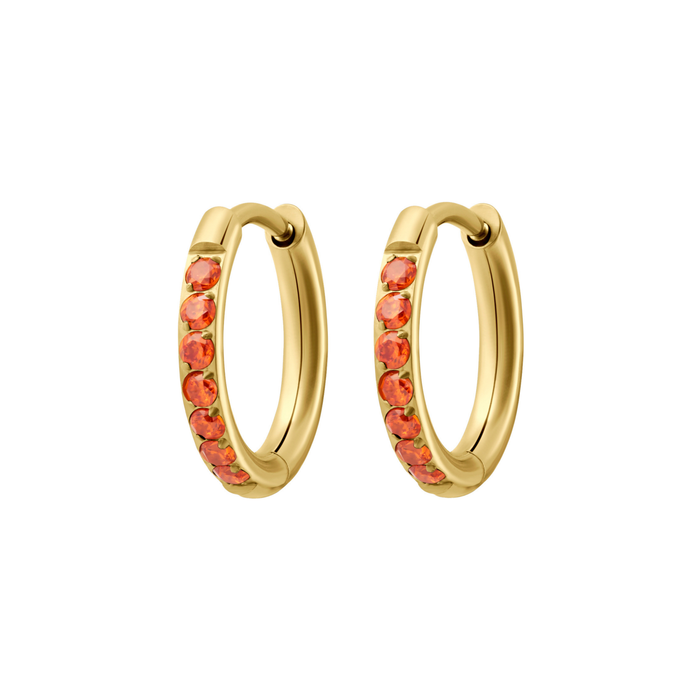 Gold hoop earrings with orange gemstones on a white background