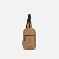 A Sherpani Metro Sand Anti-theft Reversible Sling, front view showing lockable pocket and main strap on white background. #color_sand-tan