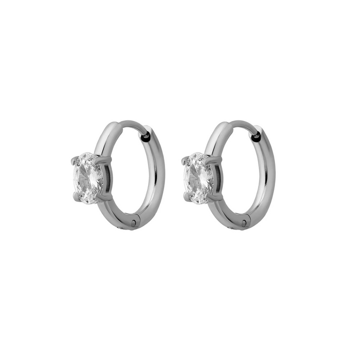 Pair of silver hoop earrings with clear gemstones on a white background