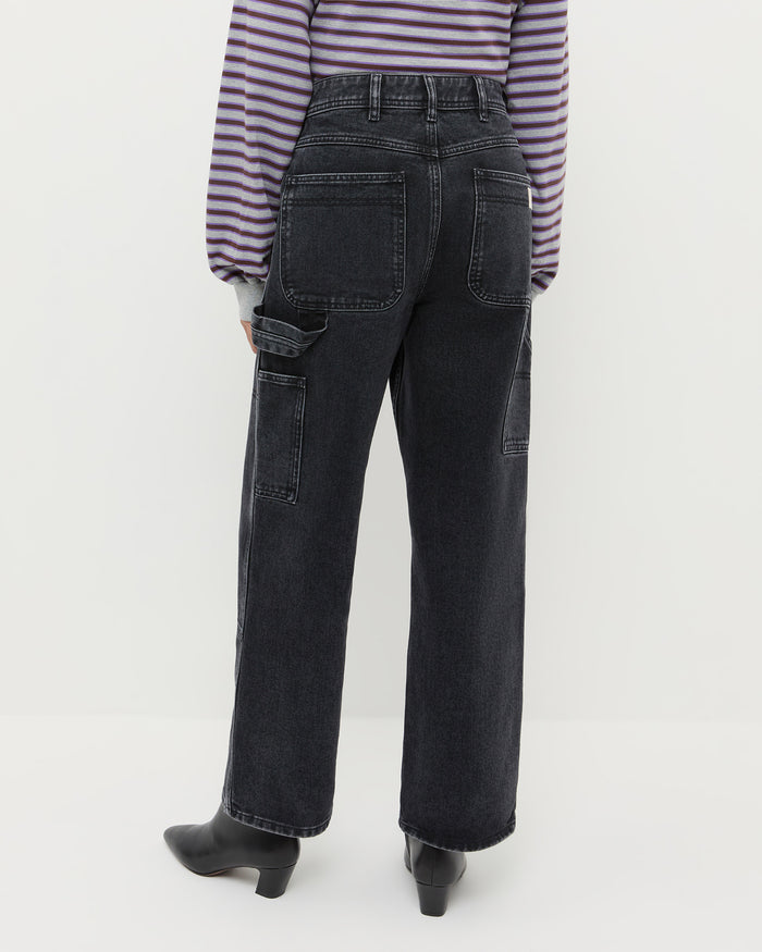 Molly Workwear Jean in washed black denim, Scout Long-Sleeve Top in grey and purple cotton, and Harper Black Leather Ankle Boot.