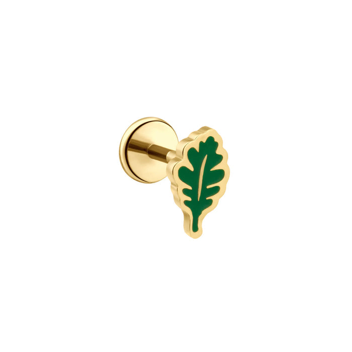 Gold-colored earring with green oak leaf design on a white background