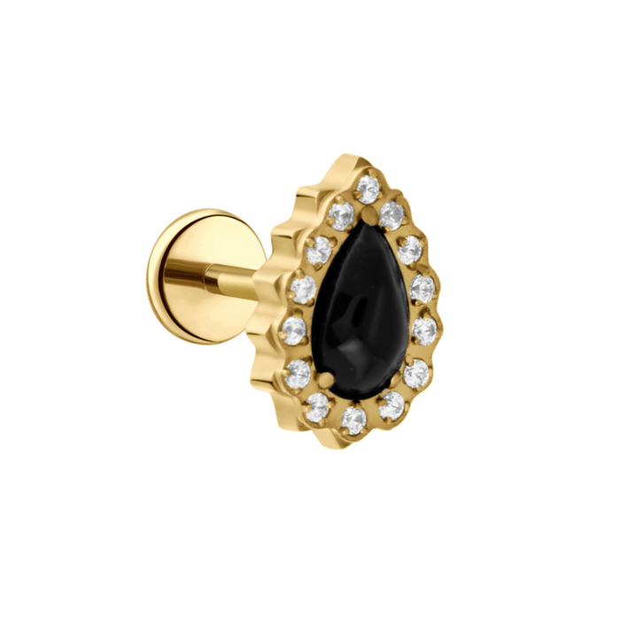 Gold labret earring with a black onyx teardrop gem and clear stones surround on a white background
