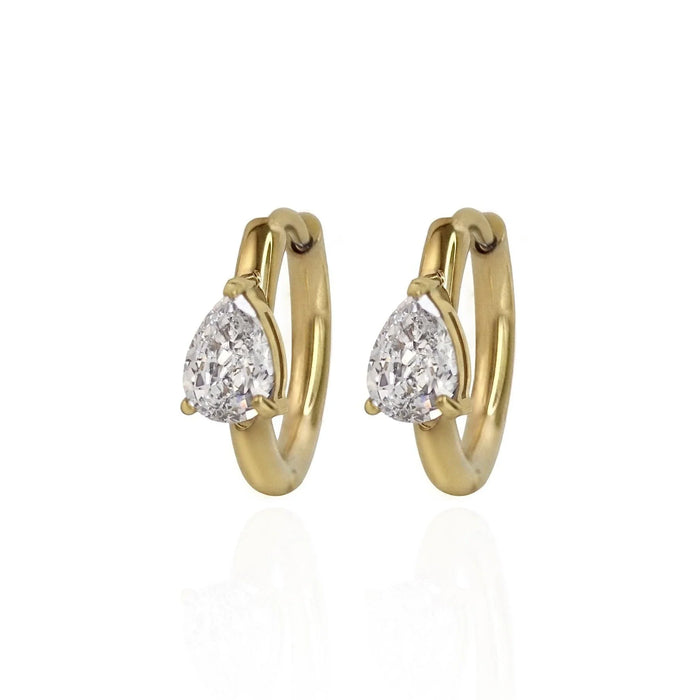 Gold hoop earrings with pear-shaped gemstones on a white background