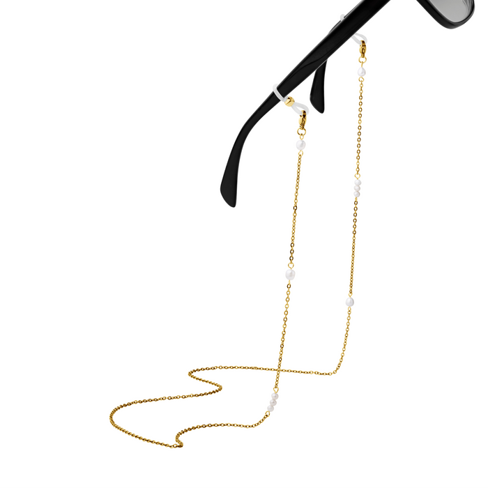 Gold eyeglass chain attached to black sunglasses on a white background