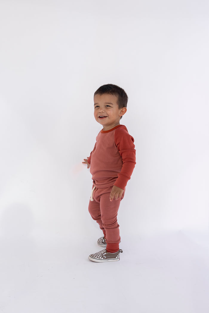 rib knit pant - sunset - barn red