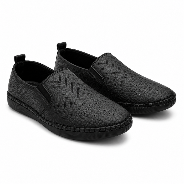 Slip-on flats with perforated geometric details
