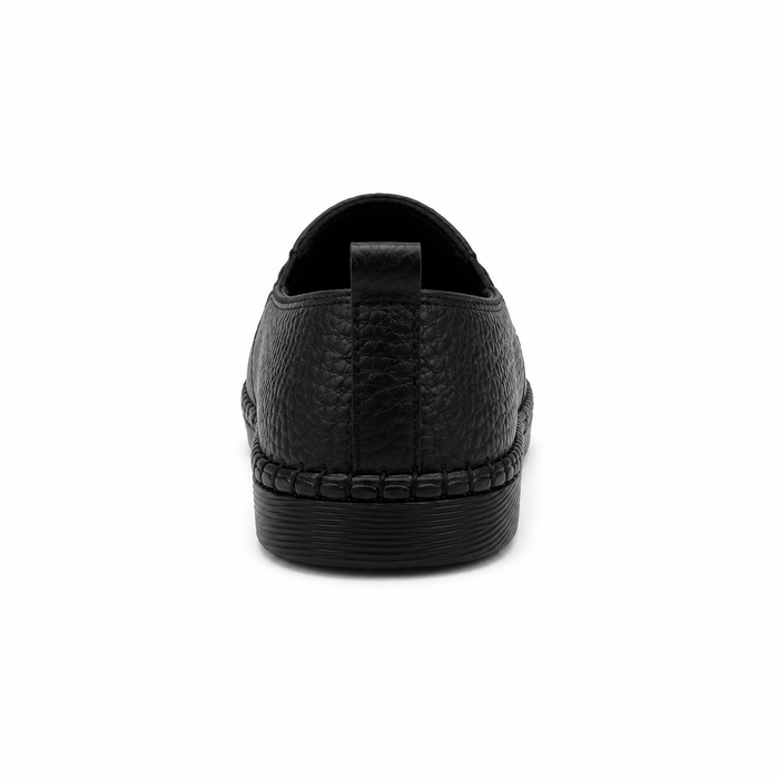 Slip-on flats with perforated geometric details