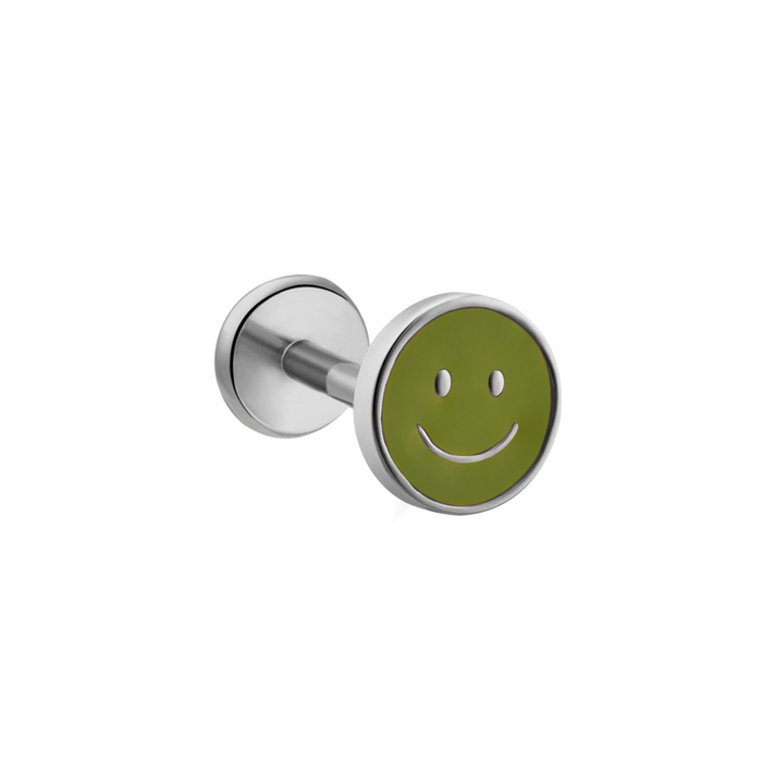 A silver-toned circular enamel flat back stud with a green smiley face insert, shown against a plain white background.