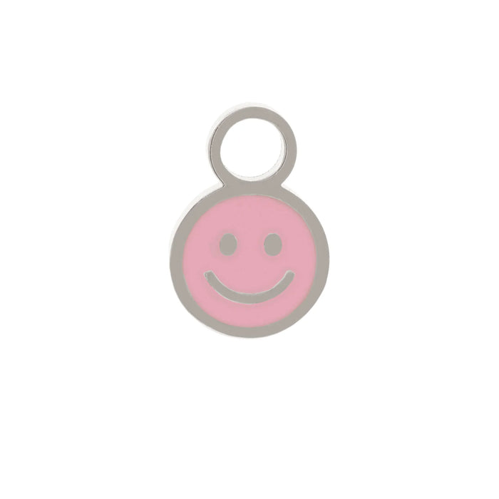 A small smiley face charm with a silver-tone metal border and loop, featuring a light pink enamel face on a white background.