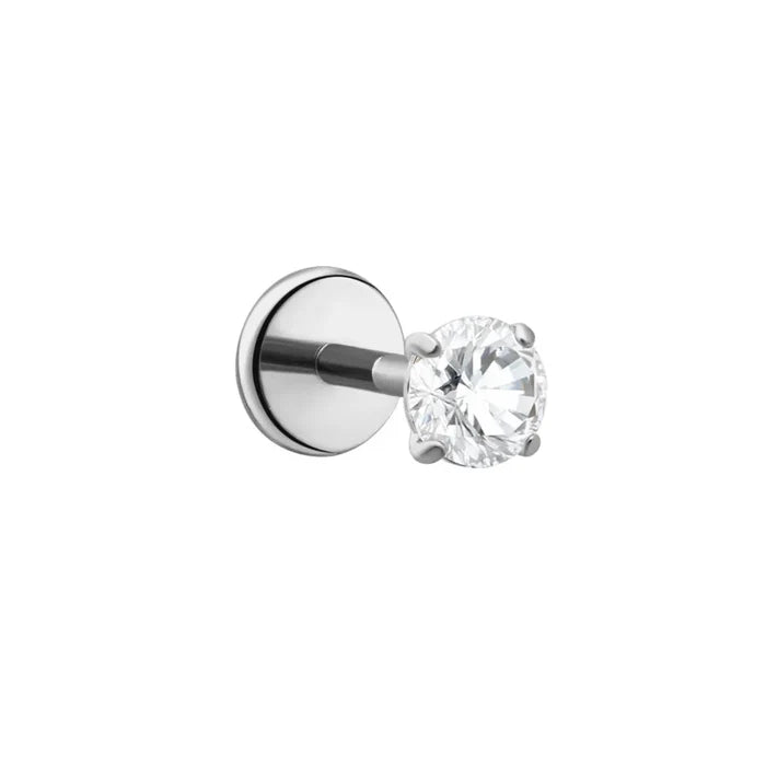 A single titanium silver stud earring featuring a round brilliant-cut clear CZ stone in a four-prong setting, shown against a solid white background.