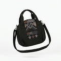 Textured Handbag With Ethnic Woven Front Panel