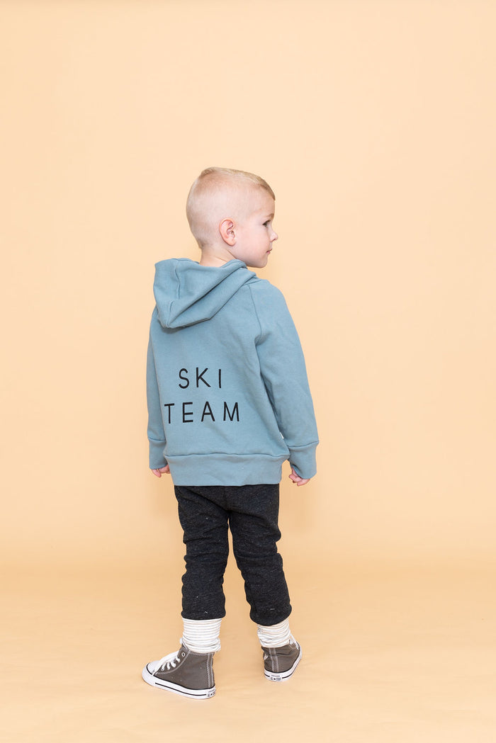 trademark raglan hoodie - ski team on rainwater (black)