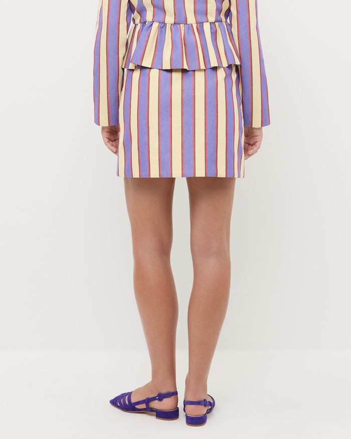 Vita Skirt in jewel and butter striped cotton-linen fabric, Sable Jacket in jewel and butter striped cotton-linen fabric, and Shelly Jewel Suede Flat Sandal.