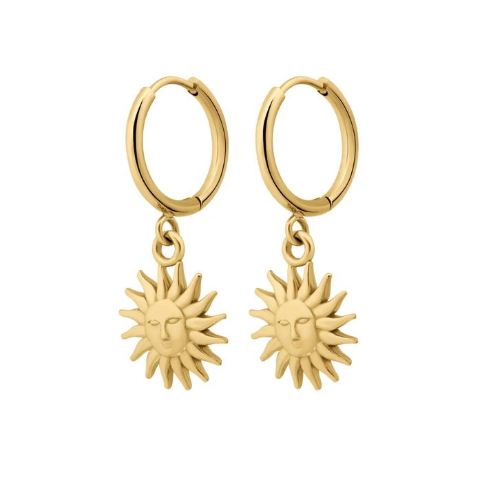 Gold hoop earrings with sun-shaped charms on a white background