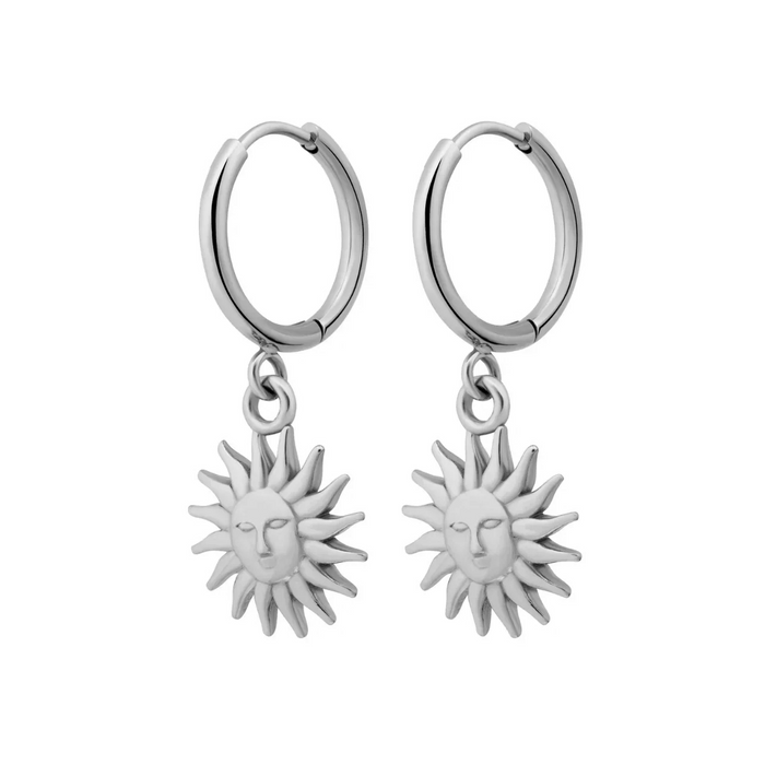 Silver hoop earrings with sun-shaped charms on a white background